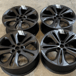 Four black rims favicon